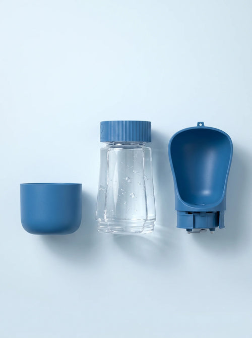 Coziekin travel water bottle components: cup, leak-proof bottle, and scoop bowl
