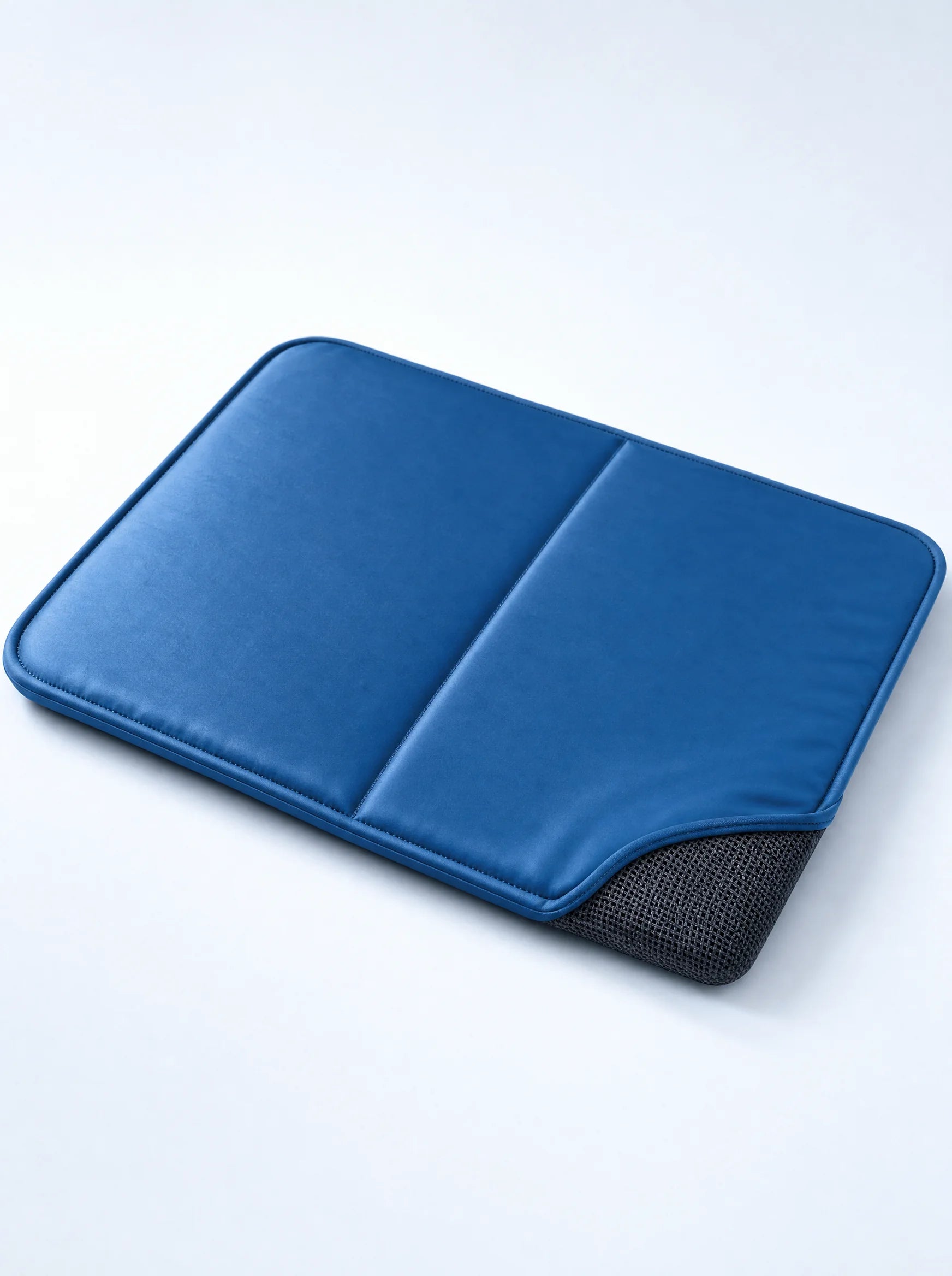 Coziekin cooling mat in water droplet blue, three-quarter view showing padded thickness